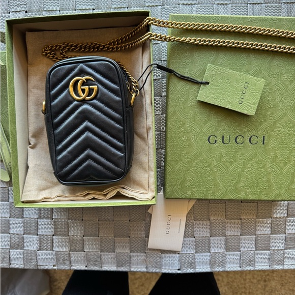 Gucci Black Quilted Mini Bag with Gold Chain almost new, only used it twice - Picture 1 of 5